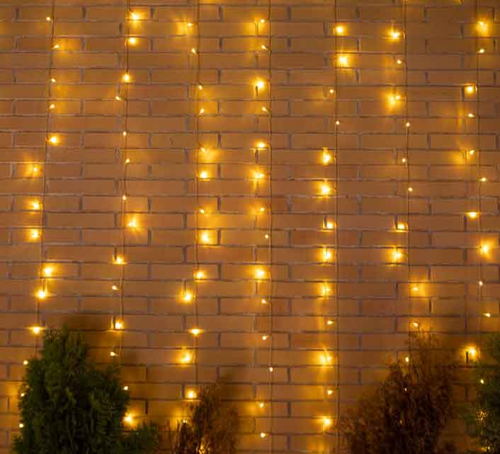 Rideau Guirlande Extérieur 6x3m 700 Led Blanc Chaud Luceo